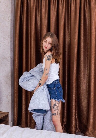 Sasha Paige in Skinny inked babe playind in bed from 