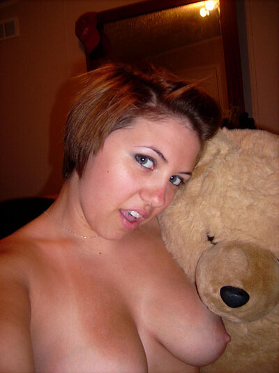 Amber D, the cute, big-boned former girlfriend, enjoys self-pleasure while flaunting her luscious, large breasts on film.