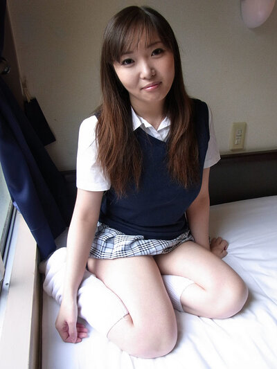 Haruka's showing her massive chest while wearing her school girl outfit.