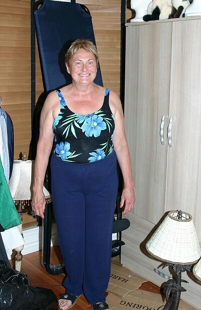 Grandma Ginger Spice flaunts her jiggly hooters and ample behind, then deepthroats a dick.