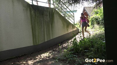 Eveline Neill in Crouching Pee from 