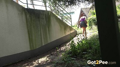Eveline Neill in Crouching Pee from 