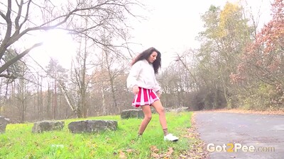 Mini Mitzi in Rock Squatting from